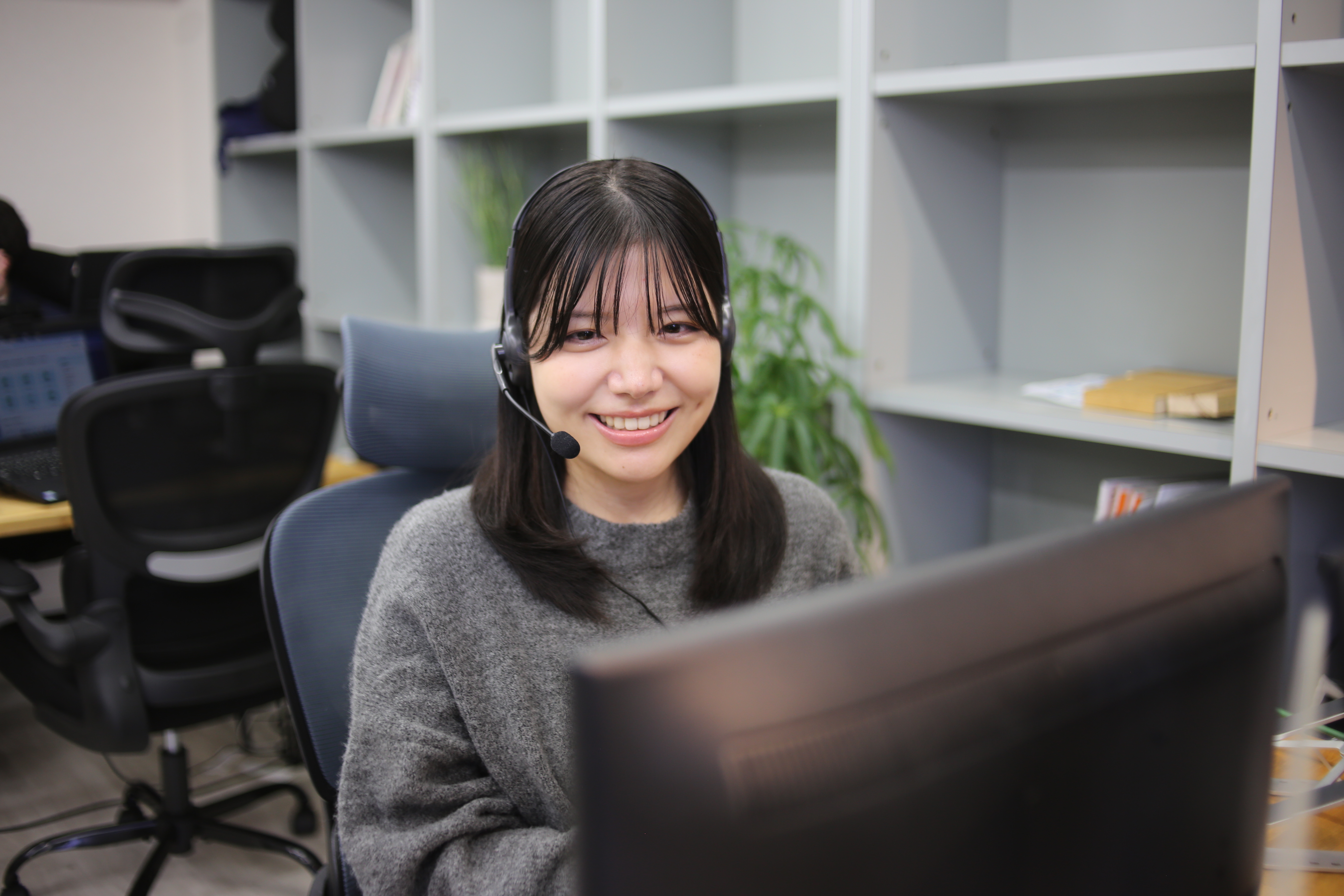 求人票の作成やデザイン制作を担当するスタッフの写真